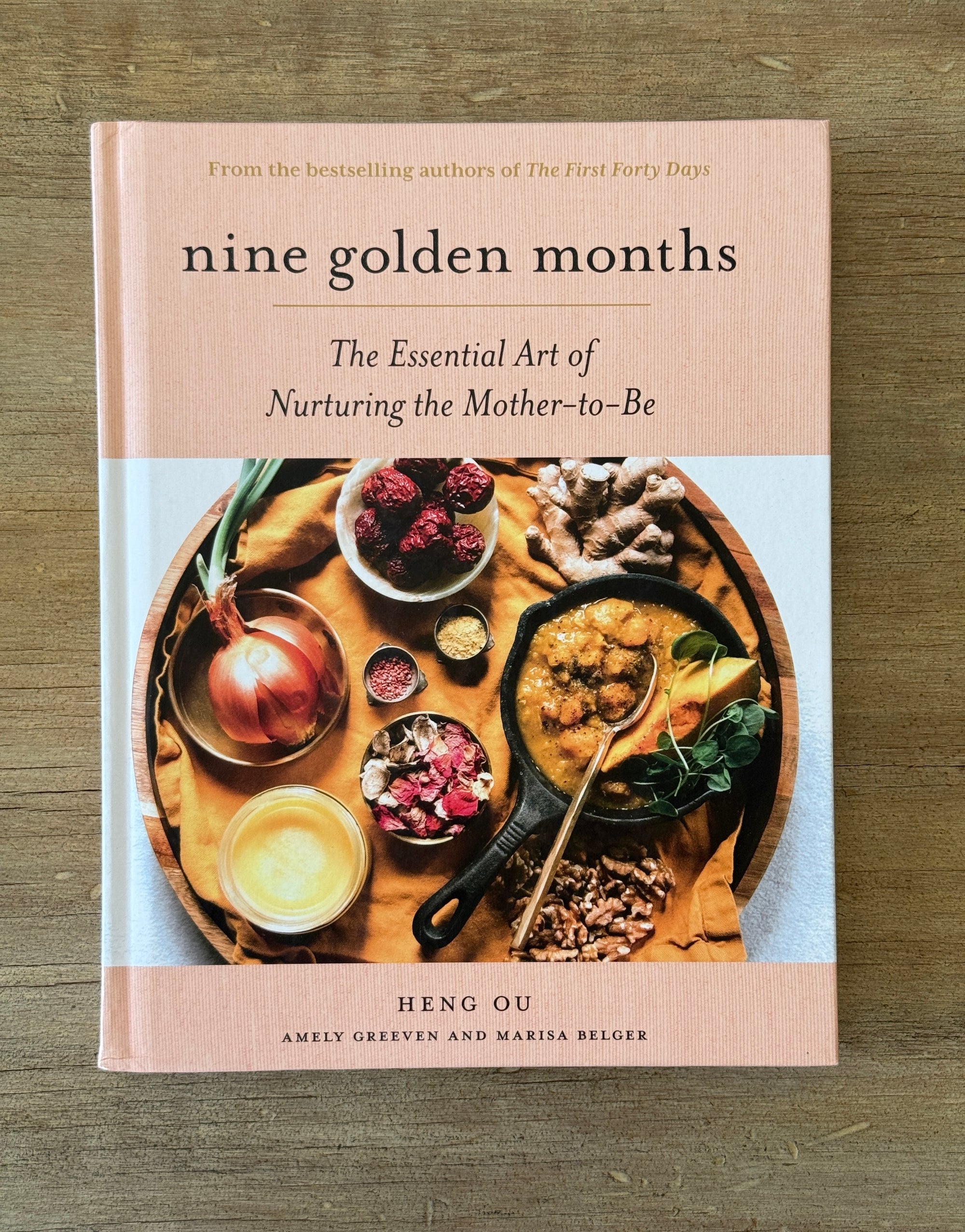 “Nine Golden Months” by Heng Ou - Hardcover Book